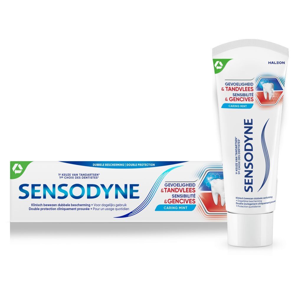 Tandpasta tube en verpakking. Wit, blauw en rood. Tekst: SENSODYNE, Gevoeligheid & Tandvlees, Sensibilité & Gencives, Caring Mint.