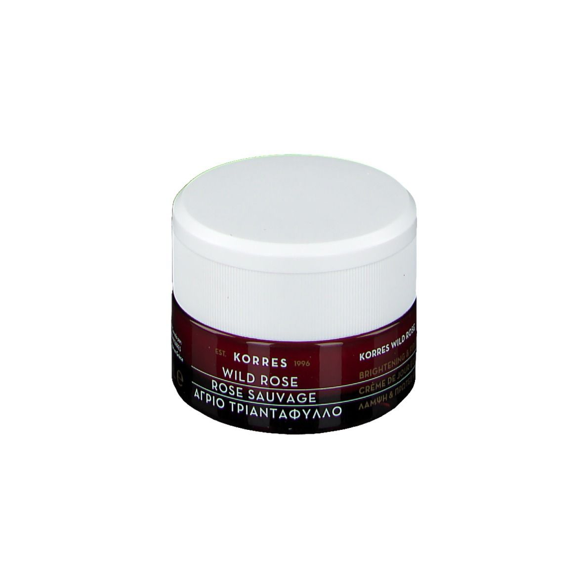 Korres Wild Rose crème pot, witte deksel, donkerrode band. Tekst: Wild Rose Rose Sauvage, Brightening & First Wrinkles.