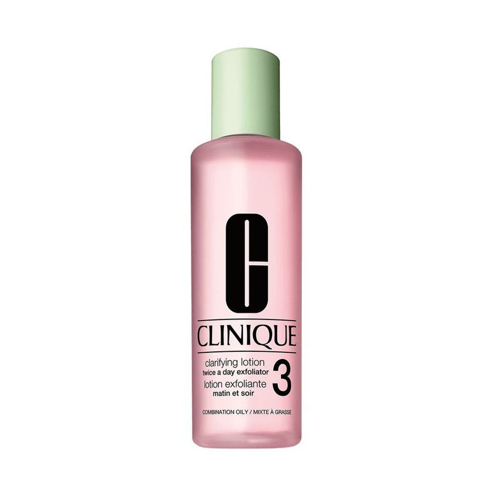 Roze fles met groene dop. Opschrift: CLINIQUE, Clarifying Lotion 3. Voor de gemengde tot vette huid.