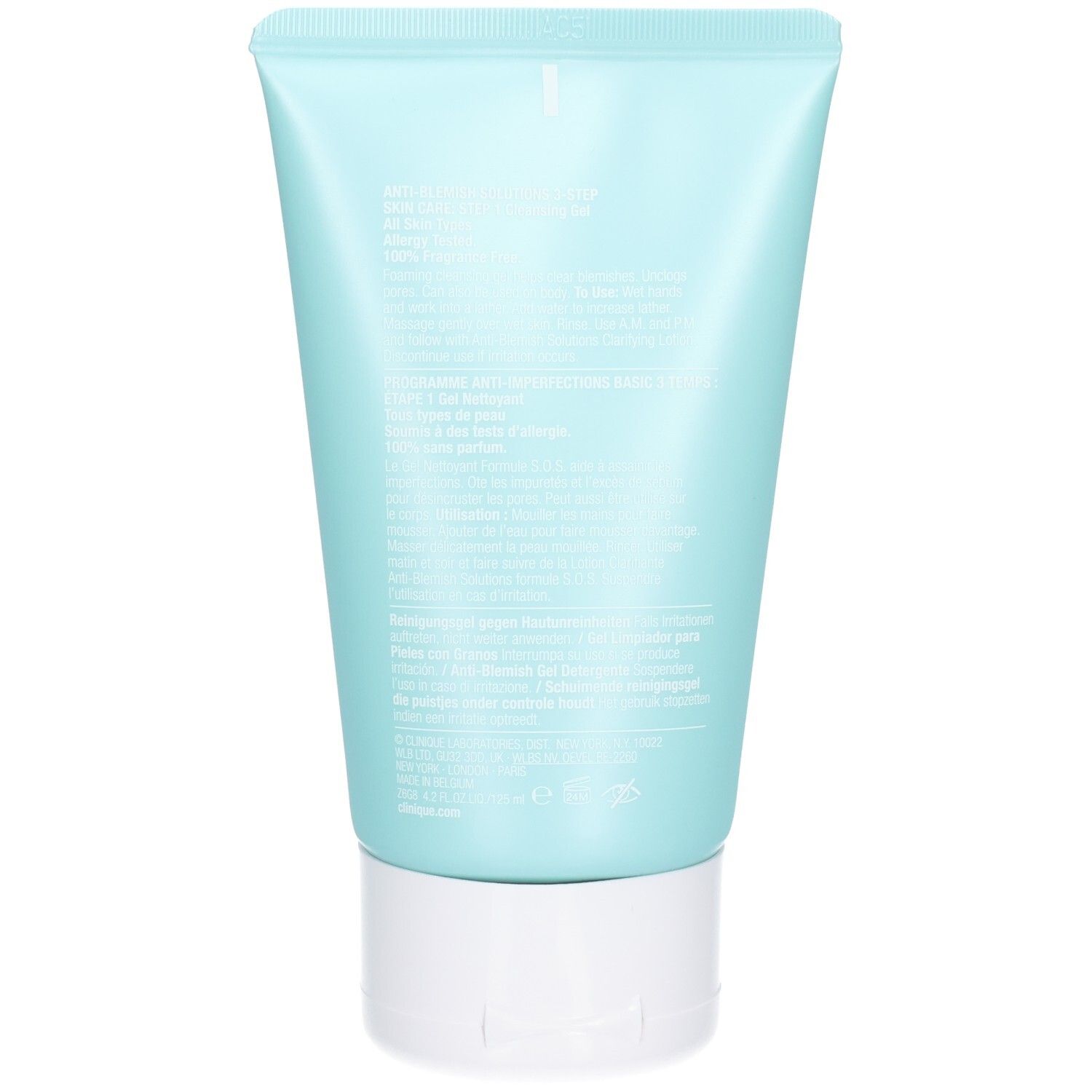 Achterkant van een lichtblauwe tube met witte dop. Bevat tekst in meerdere talen. Geen merk of productnaam zichtbaar.