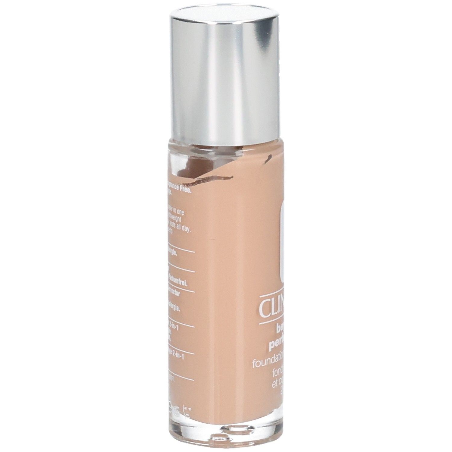 Beige foundationflesje met zilveren dop. Opschrift: Clinique, beyond perfecting, foundation + concealer, 2 in 1. Tekst op achterkant.