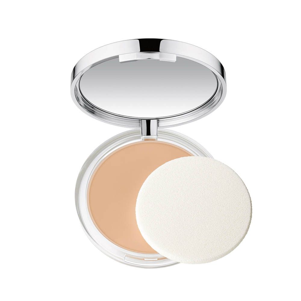 Poudre compacte Clinique avec miroir et applicateur.