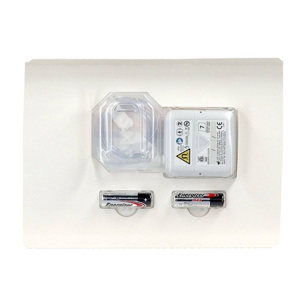 Componenten van het Pico 7 wondtherapiesysteem: pomp, reservoir en batterijen. Alles in een witte plastic verpakking.