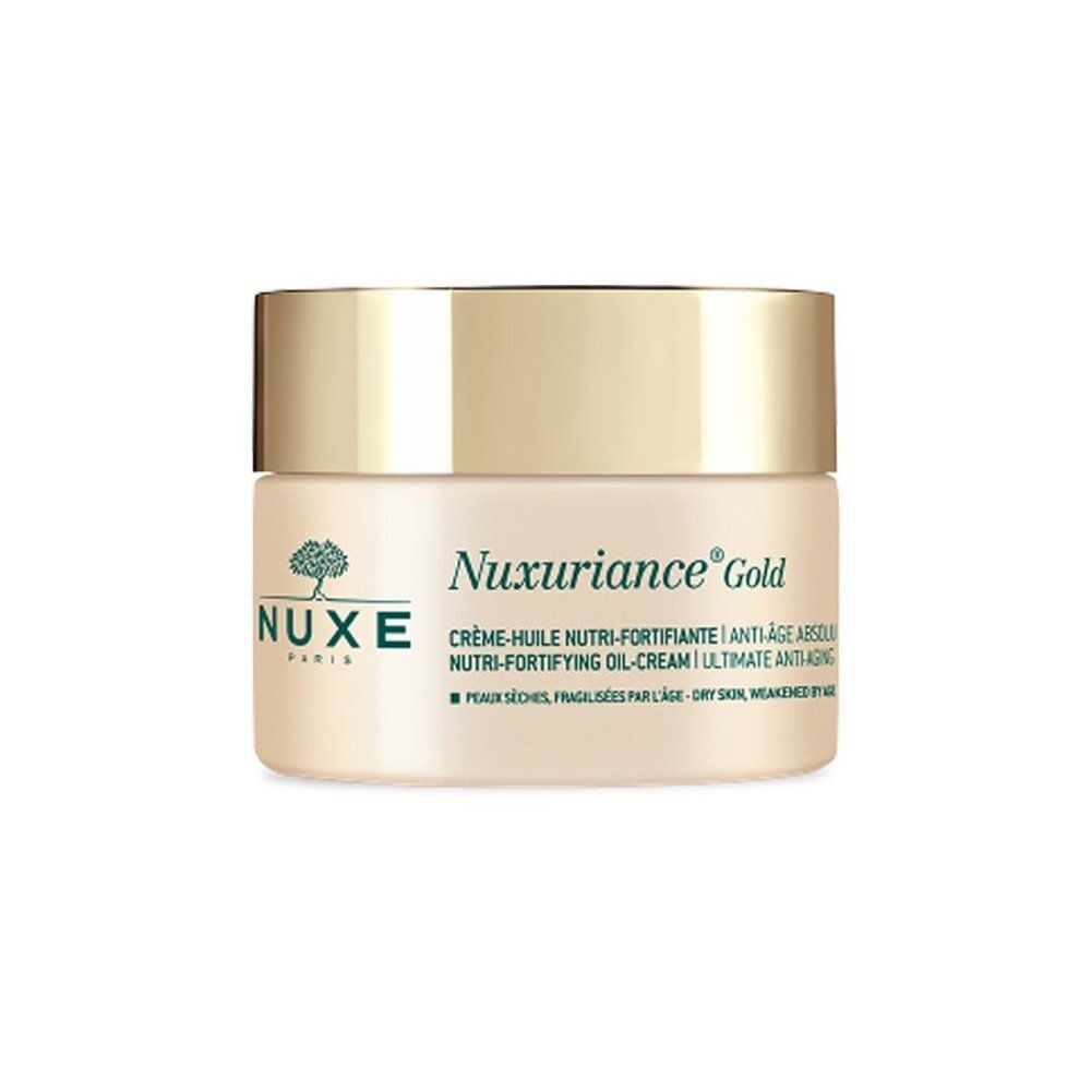Nuxe Nuxuriance Gold Olie-Crème in een glazen pot met zilveren deksel.