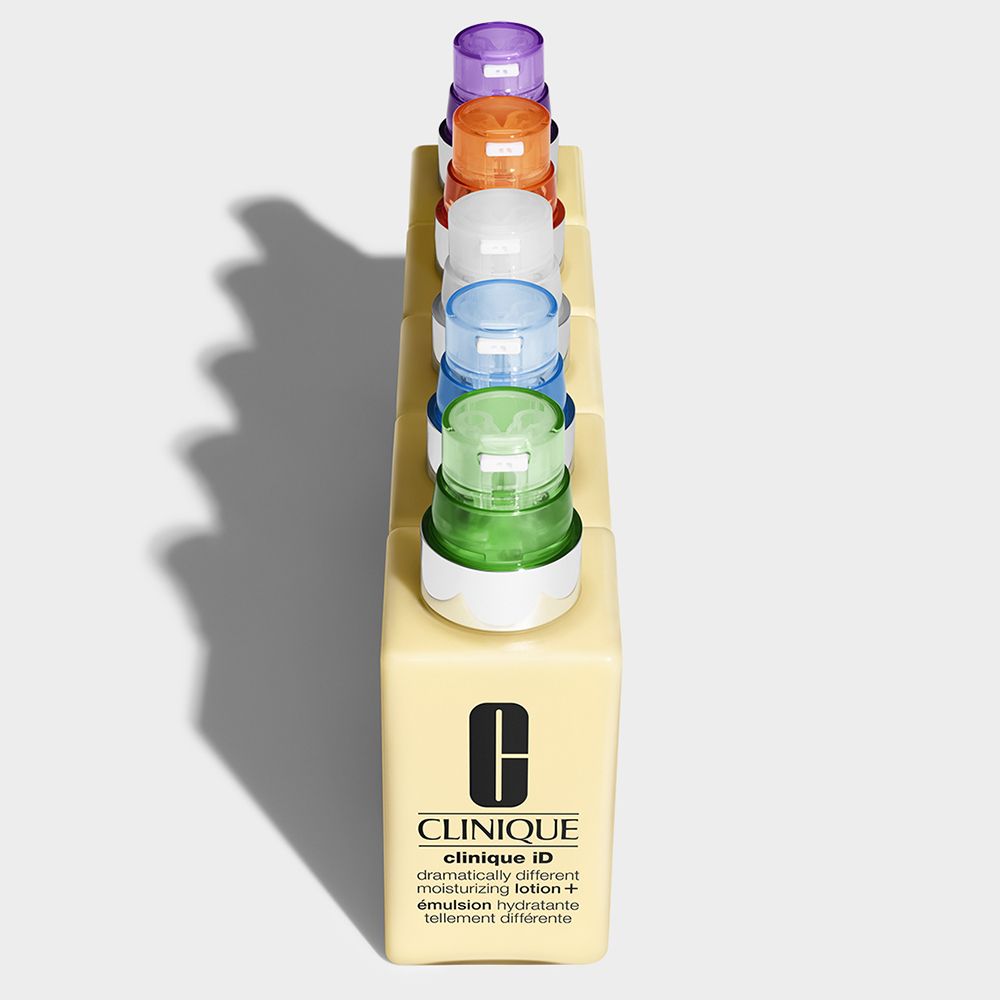 Zes CLINIQUE iD™ producten in een display. Verschillende kleuren cartridges.