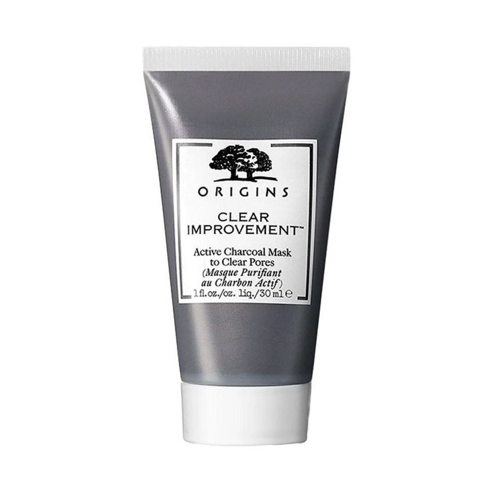 Tube gris avec logo et texte "CLEAR IMPROVEMENT". Masque au charbon actif pour pores.