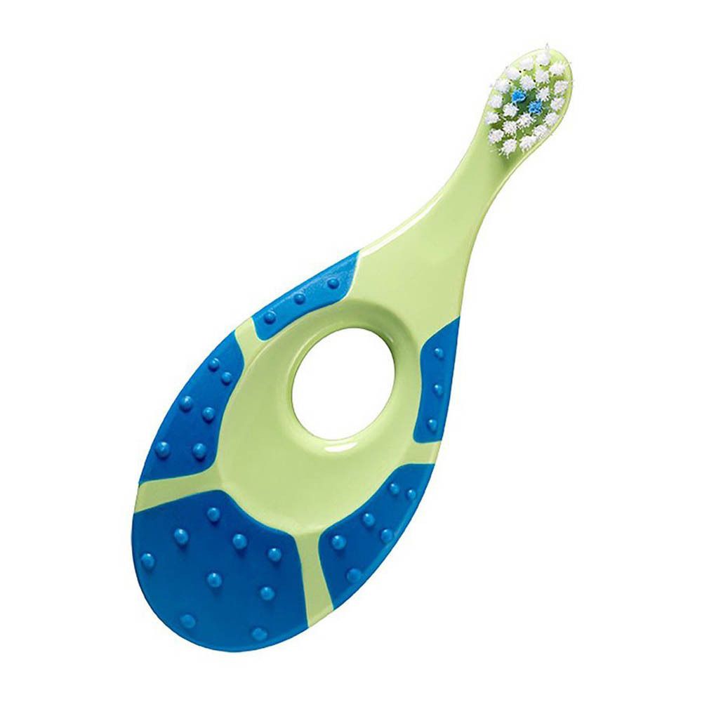 Brosse à dents verte et bleue pour bébé. Manche percé, poils blancs. Marque Jordan. Pour 0-2 ans.