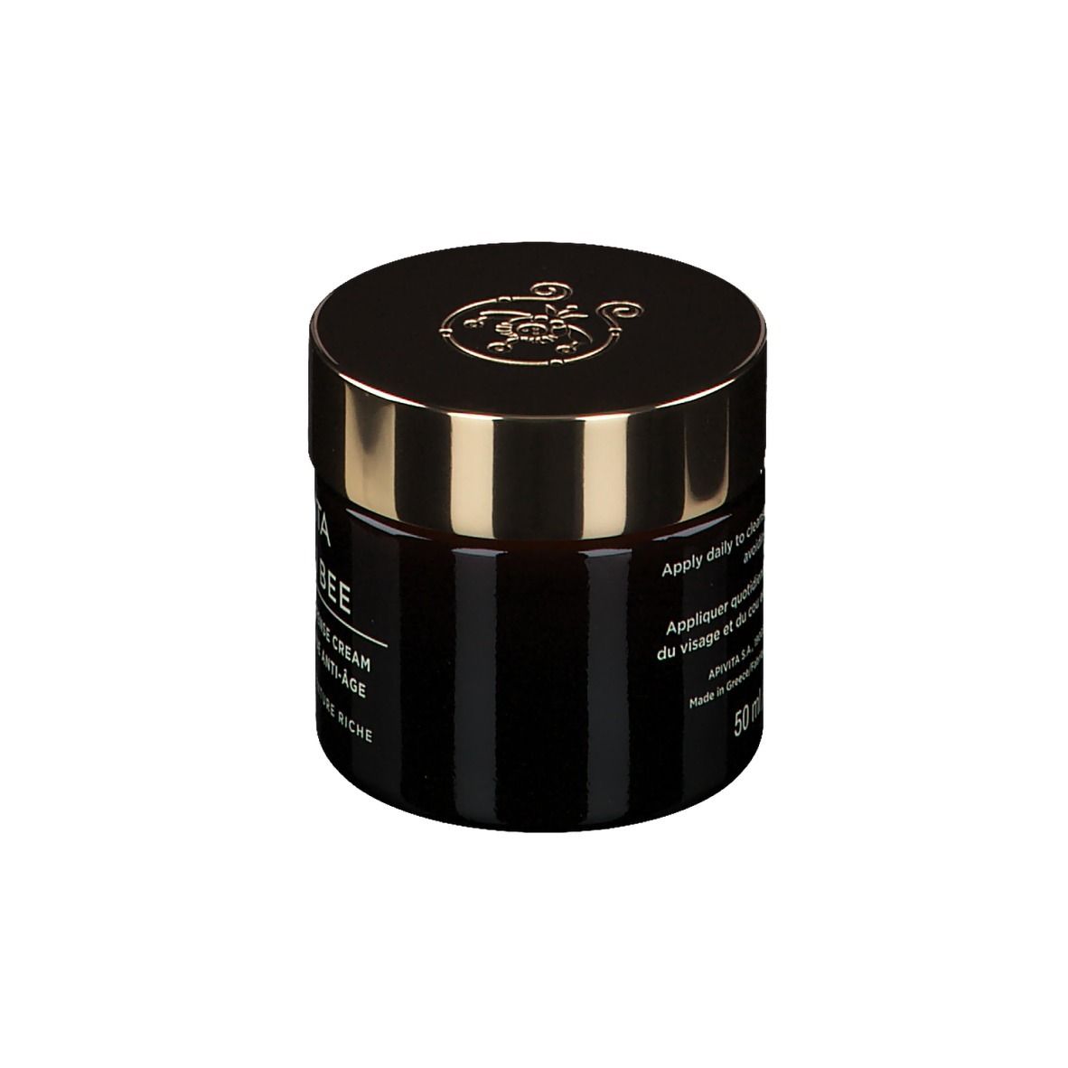 Donkerbruine crèmepot met gouden deksel. Opschrift: Apivita Queen Bee, Holistic Age Defense Cream.