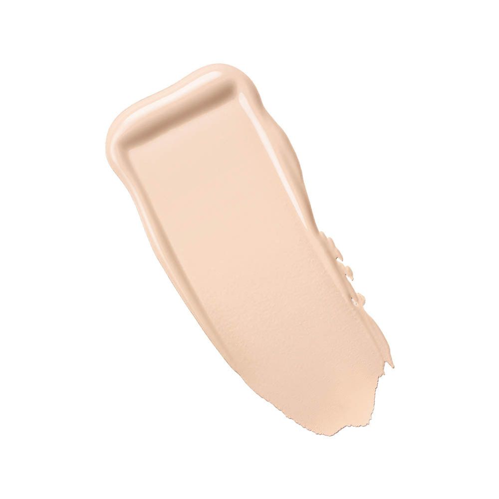 Een enkele romige huidskleurige veeg op een witte achtergrond.