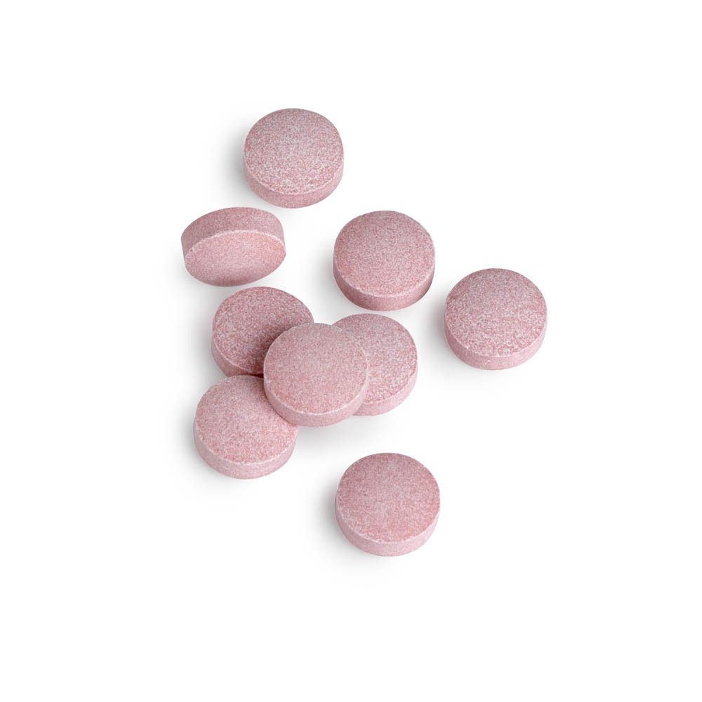 Roze tabletten. BIOTICS RESEARCH® B12-2000™. Meerdere tabletten op witte achtergrond.