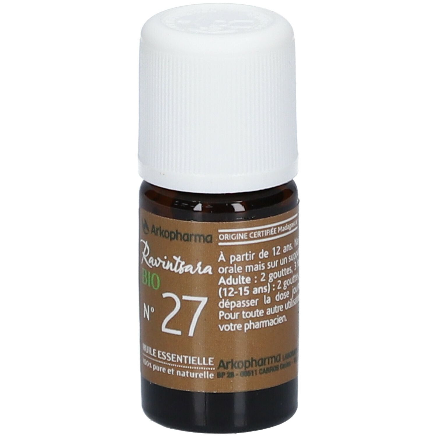 Bruine glazen fles met witte dop. Opschrift: Ravintsara BIO N°27 Huile essentielle. Merk: Arkopharma.