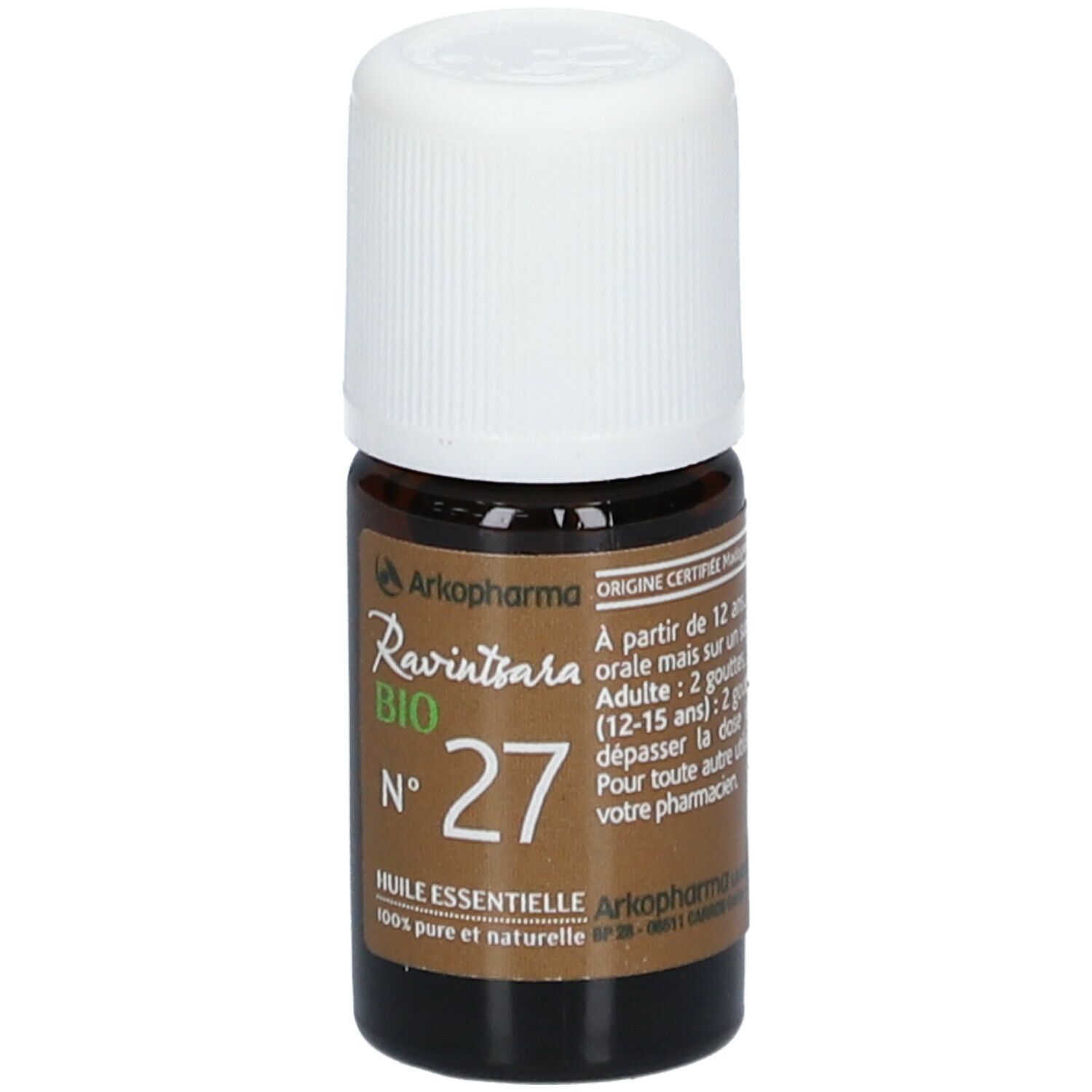 Bruine glazen fles met witte dop. Opschrift: Ravintsara BIO N°27 Huile essentielle. Merk: Arkopharma.