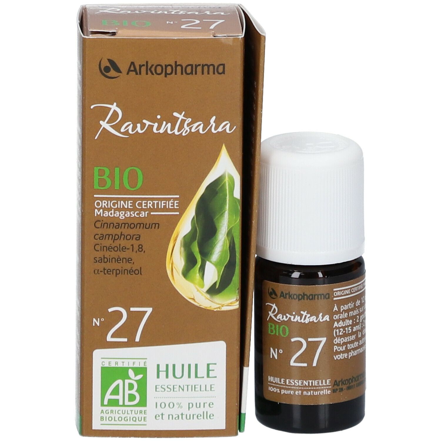Bruine glazen fles en doos. Opschrift: Ravintsara BIO N°27 Huile essentielle. Merk: Arkopharma. Certificering.