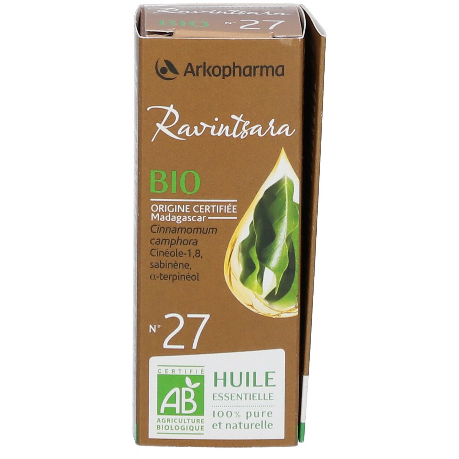 Doos en bruine glazen fles. Opschrift: Ravintsara BIO N°27 Huile essentielle. Merk: Arkopharma. Certificering.