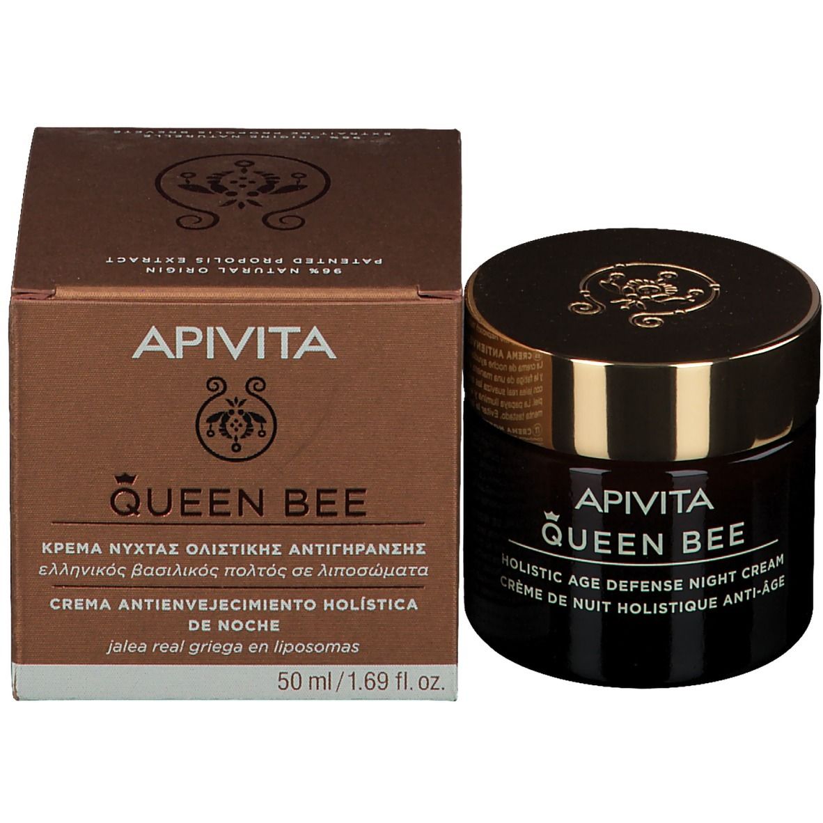 Emballage du produit avec verre et carton. Inscription : APIVITA QUEEN BEE, Holistic Age Defense Night Cream, 50 ml.