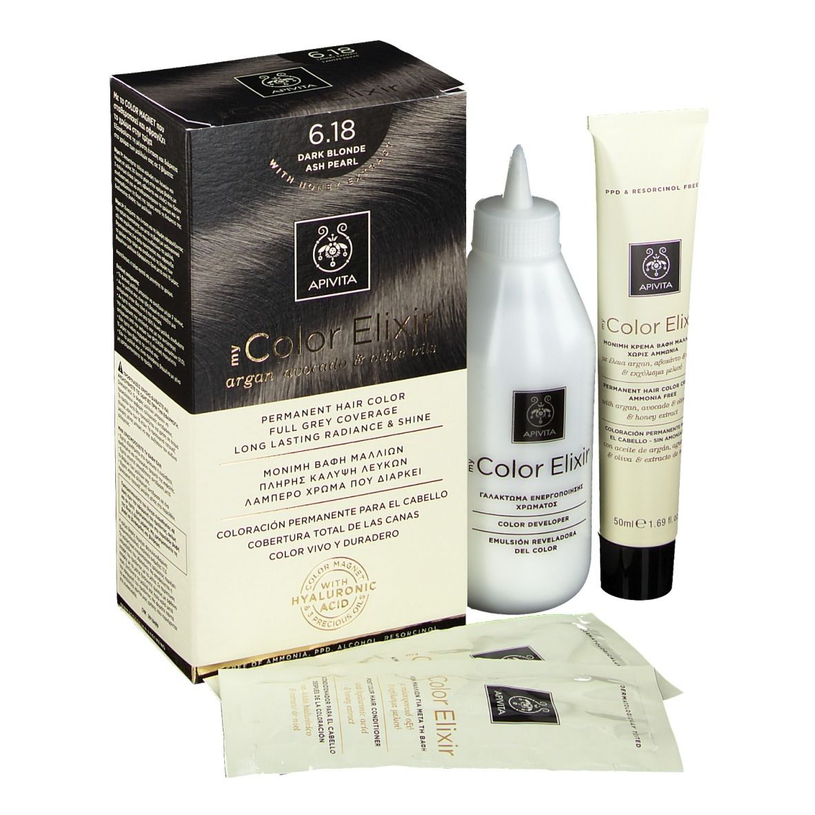 Haarkleuringsset. Bevat doos, fles, tube en zakjes. Op de doos staat "6.18 Donkerblond".