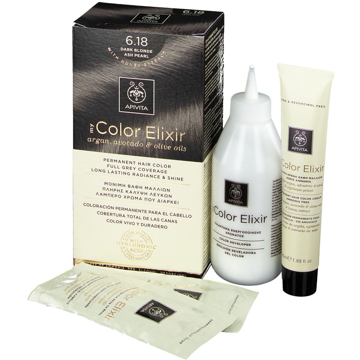 Haarkleuringsset. Bevat doos, fles, tube en zakjes. Op de doos staat "6.18 Donkerblond".