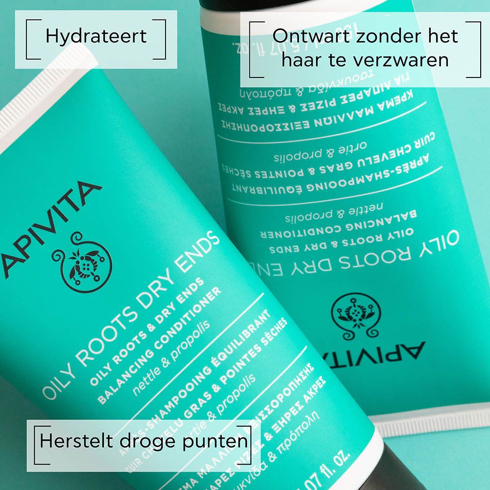 Twee tubes, APIVITA OILY ROOTS DRY ENDS, naast elkaar. Tekst: Herstelt droge punten, Hydrateert.