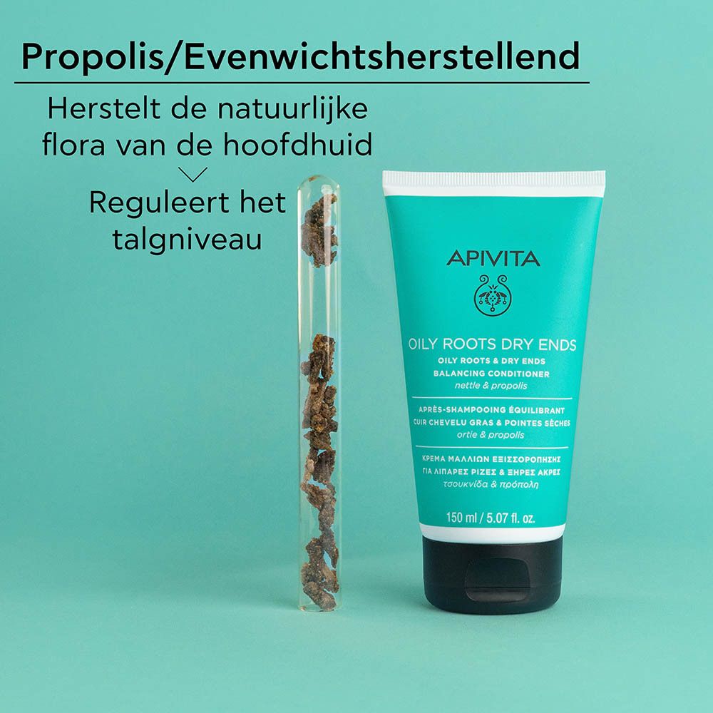 Tube naast propolis in een reageerbuis. Tekst: Propolis/Evenwichtsherstellend, Reguleert het talgniveau.