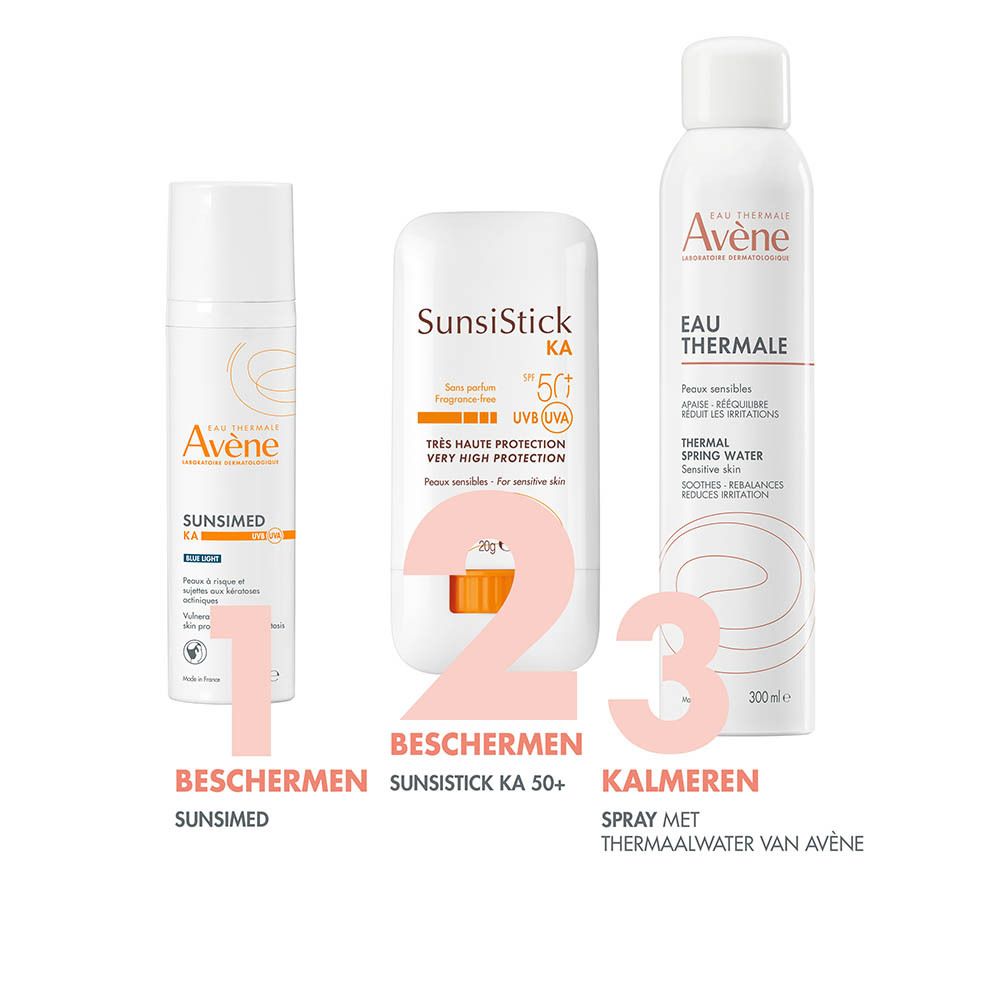 Drie Avène producten: een zonnebrandstick, een zonnenspray en thermaal water.