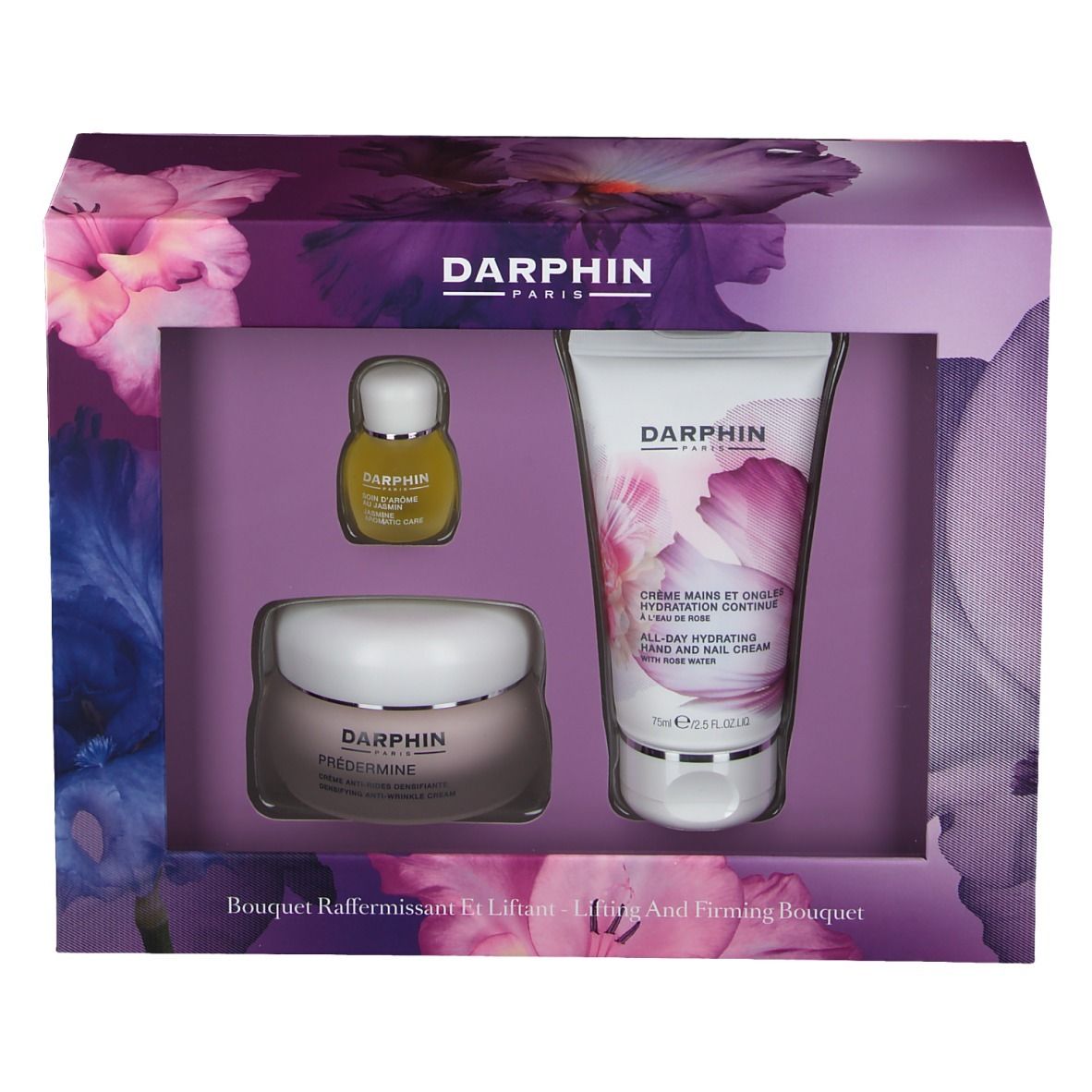 Geschenkdoos met drie producten. Bevat crème, serum en handcrème. Bloemenprint. Merklogo.