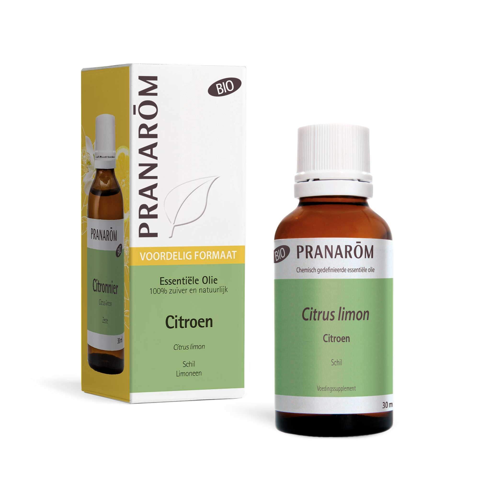 Bruine glazen fles en doos. Productlabel met tekst. 30 ml. Citroenen en bladeren.