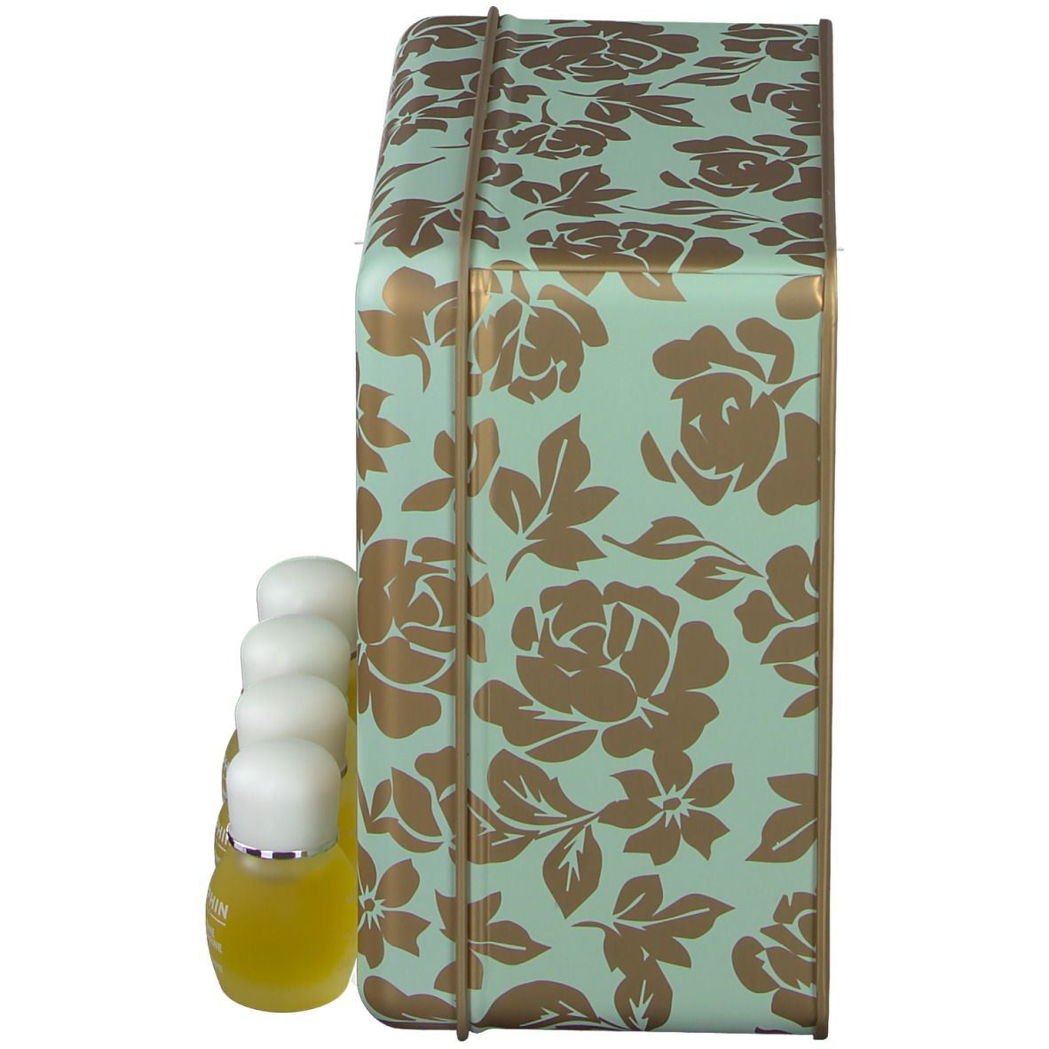 Zijaanzicht van de geschenkdoos. Mintgroene doos met gouden bloemmotieven. Vier kleine flesjes ervoor.