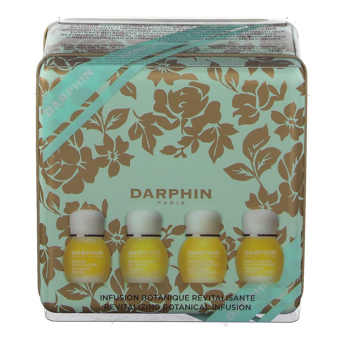 Geschenkdoos met vier kleine flesjes. De doos is mintgroen met gouden bloemmotieven. "DARPHIN" en tekst.