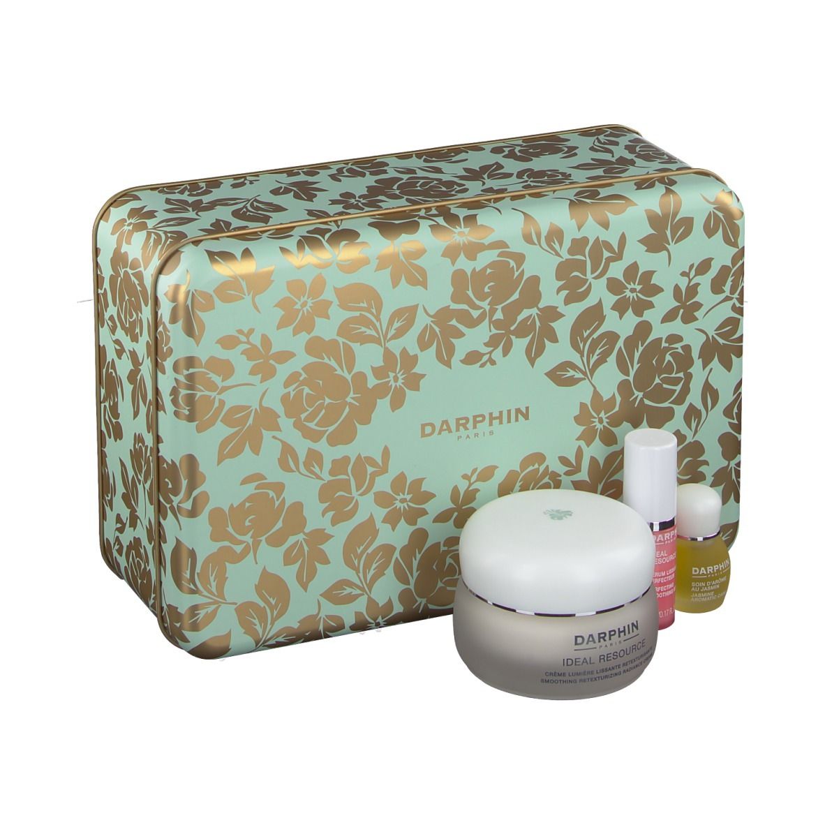 Geschenkdoos met bloemenpatroon, bevat crème, serum en olie. Merk: DARPHIN.