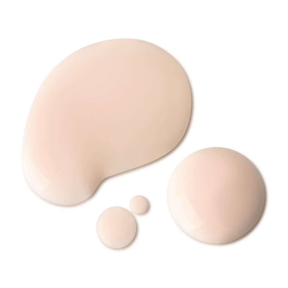 FILORGA Global-Repair Essence. Gouttes sur fond blanc. Différentes tailles et formes.