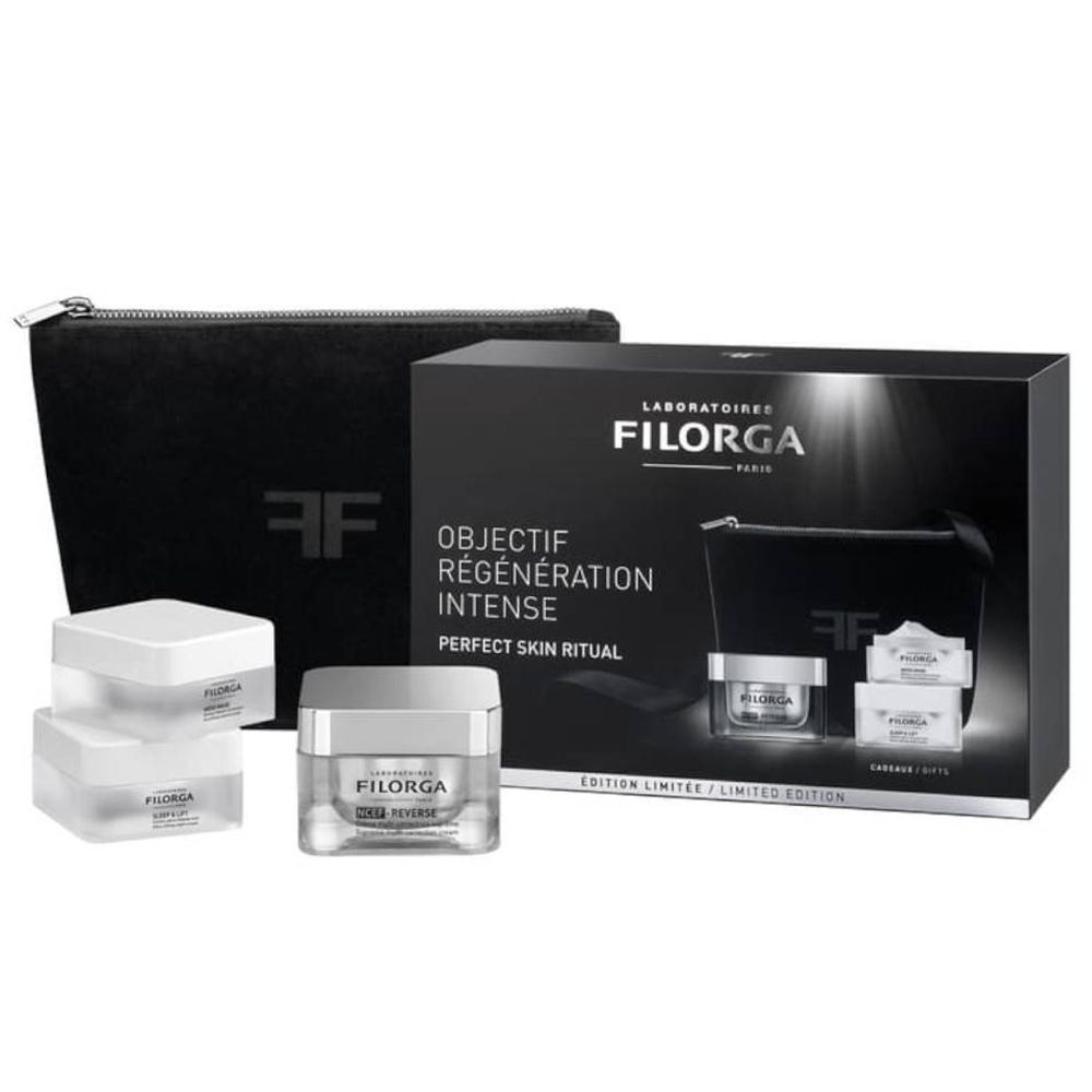 Cadeauset met cosmetica. Zwarte tas, crèmes in vierkante potjes. Filorga-logo zichtbaar. Limited edition.