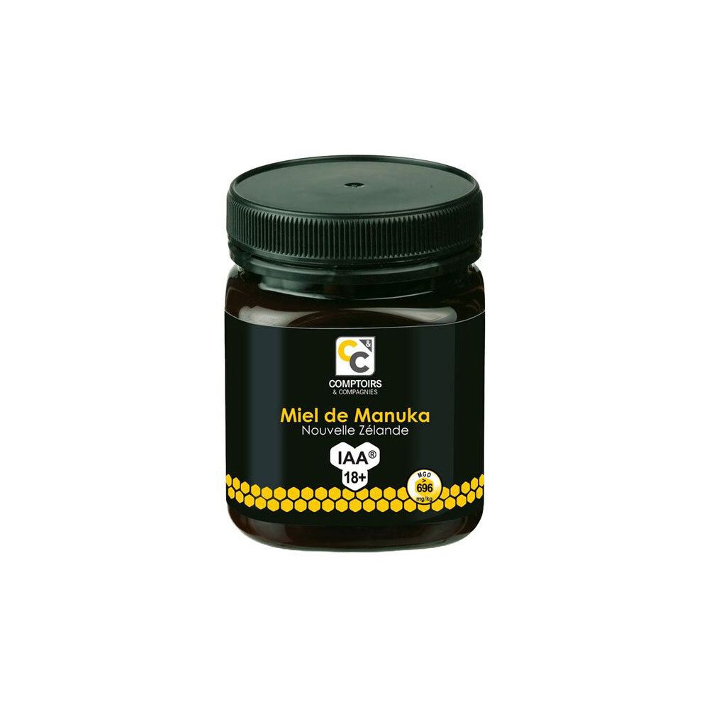 Pot de miel noir. Inscription: Comptoirs & Compagnies Miel de Manuka Nouvelle Zélande IAA 18+.