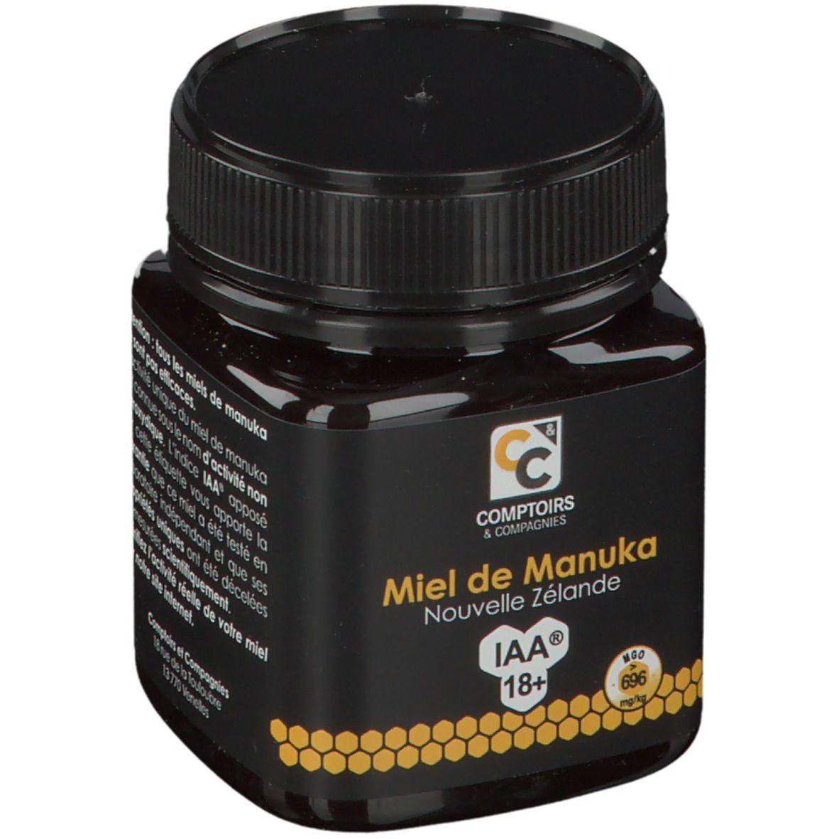 Zwarte pot honing. Opschrift: Comptoirs & Compagnies, Miel de Manuka Nouvelle Zélande, IAA 18+.