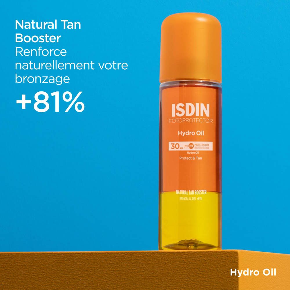 FOTOPROTECTOR ISDIN HydroOil SPF 30. Texte: Natural Tan Booster, renforce le bronzage +81%.