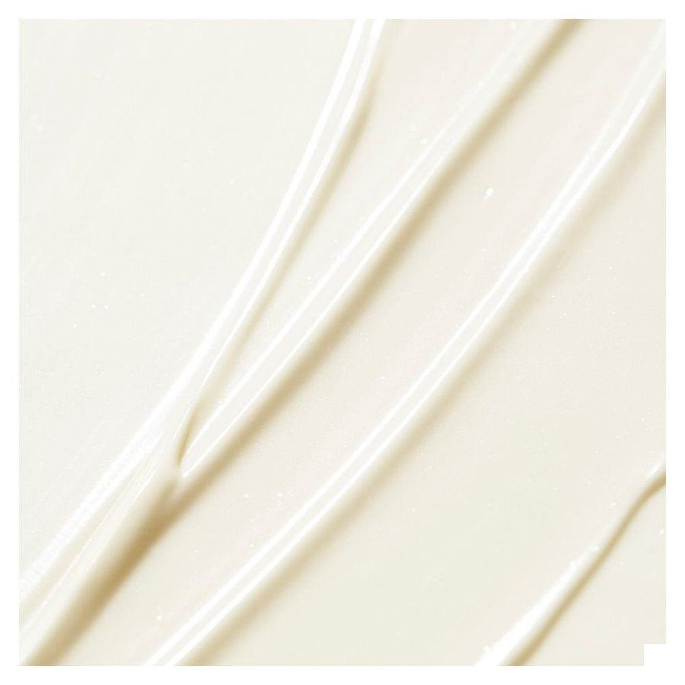 Nuxe Sun Fluide Solaire Léger SPF50 zonnebrandcrème in oranje flesje.