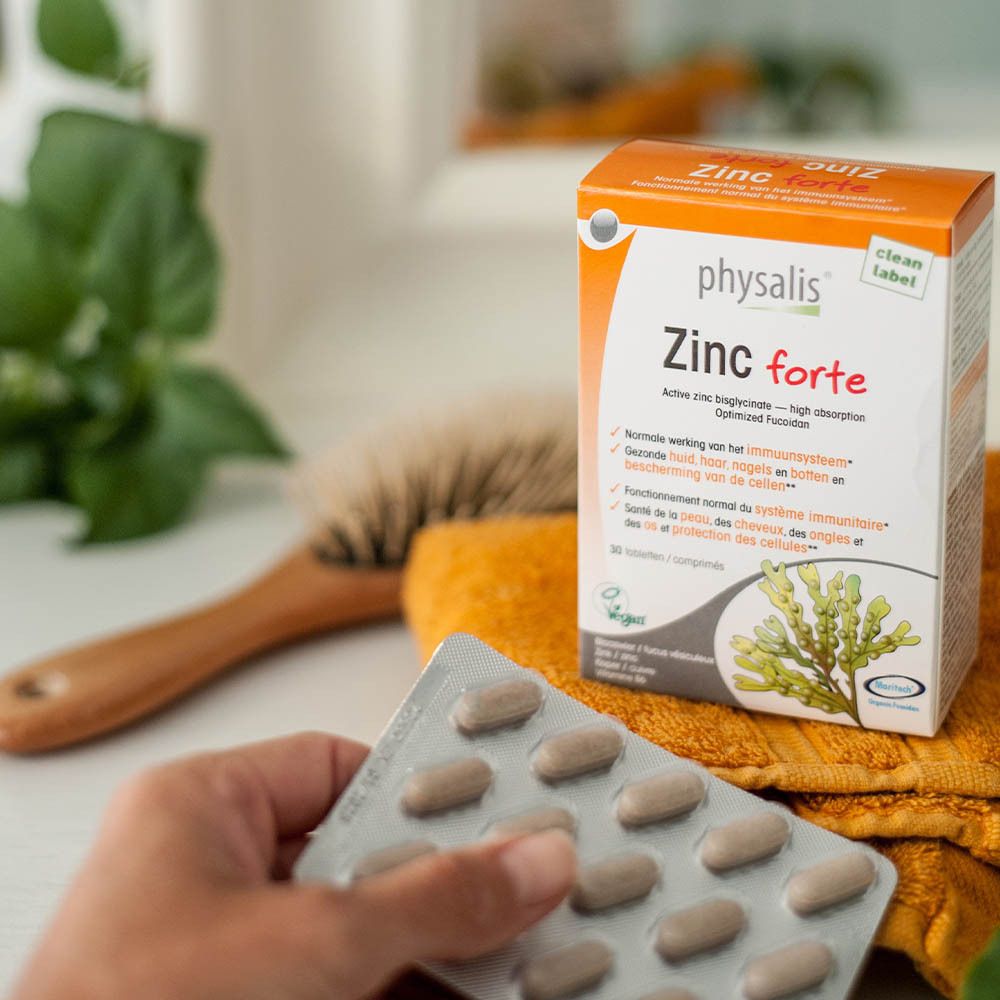 Emballage du produit Physalis Zinc forte. Comprimés en plaquettes. Ouvert, avec comprimés visibles.