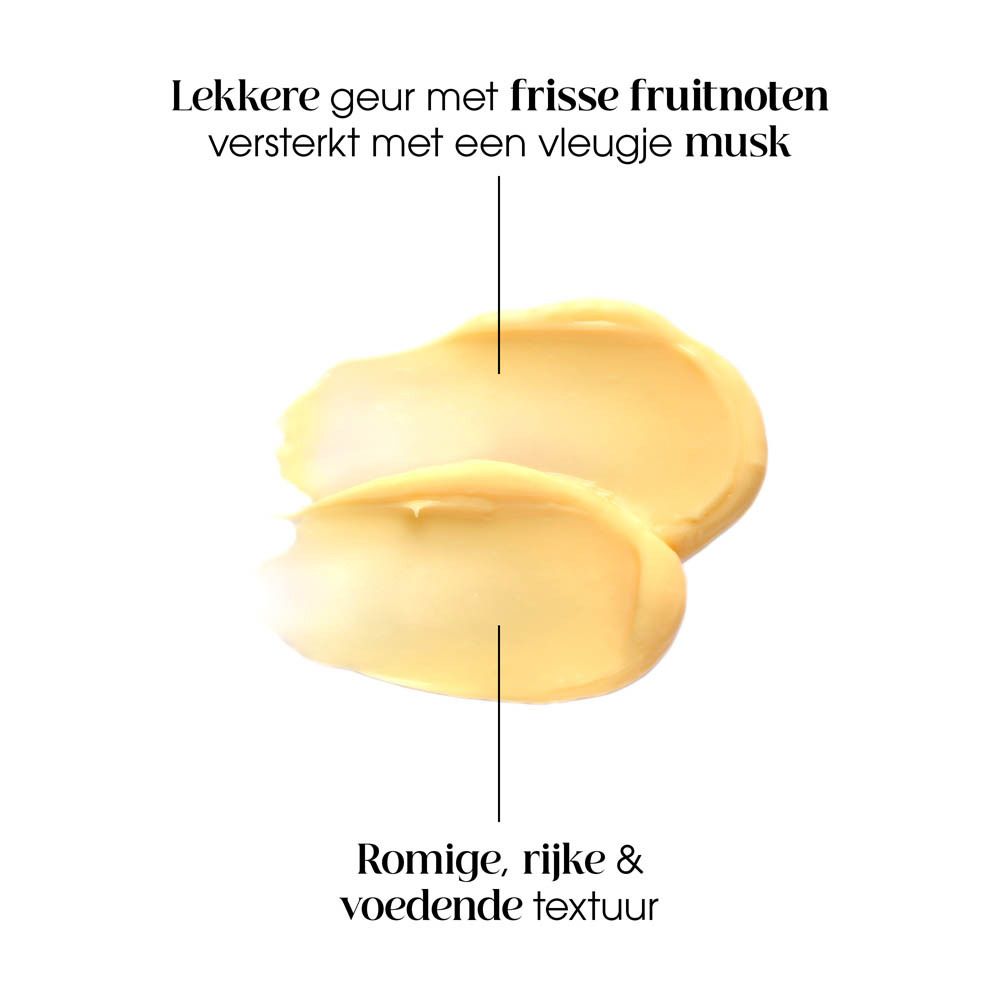 Textuurmonsters van KLORANE Mango Conditioner met beschrijving van de romige textuur.