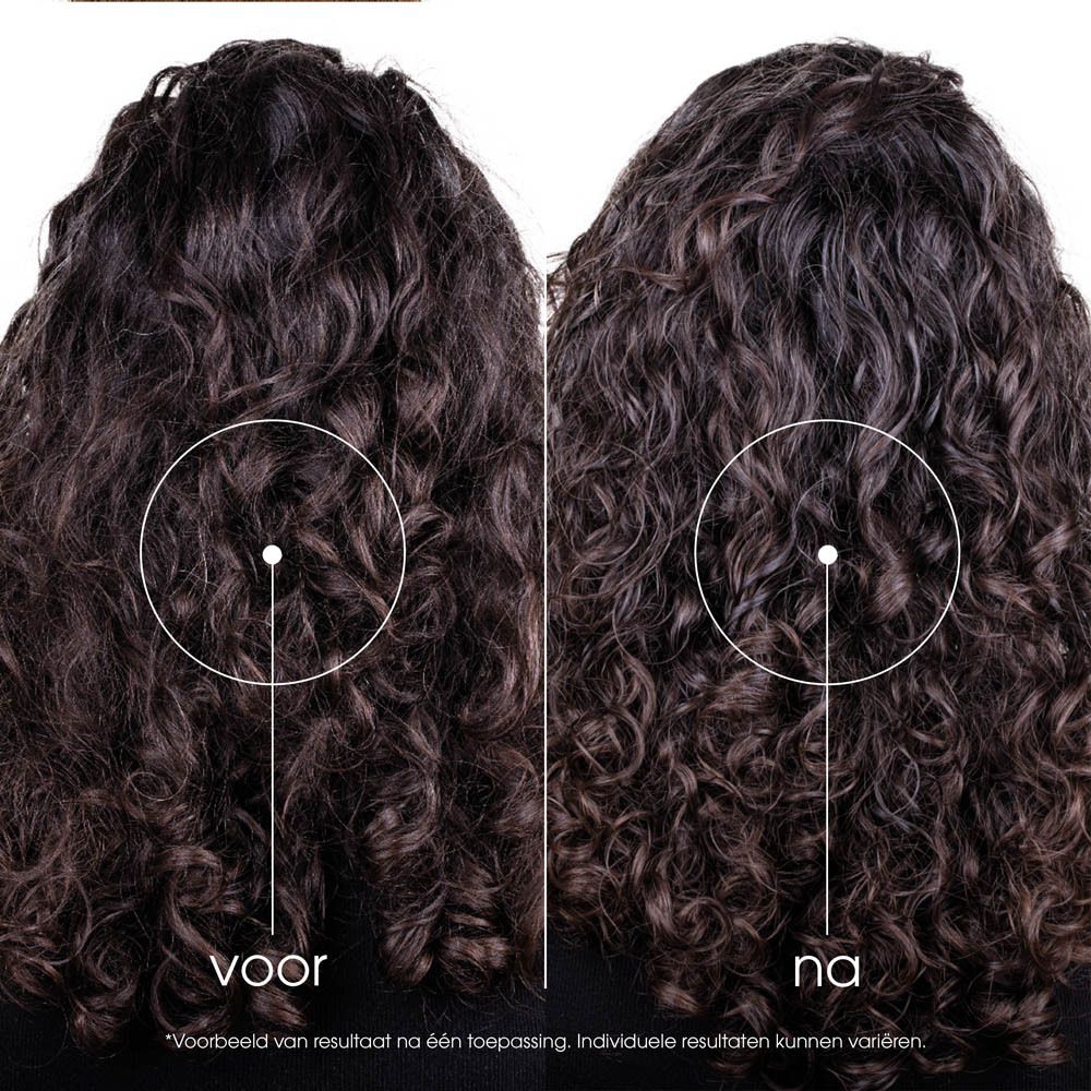 KLORANE Shampoo met Mango, 200ml. Gele vloeistof in een doorzichtige fles met witte dop.