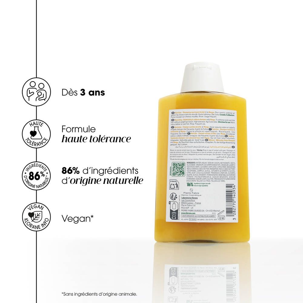 Shampoing KLORANE à la Mangue, 200ml. Liquide jaune dans une bouteille transparente avec un bouchon blanc.