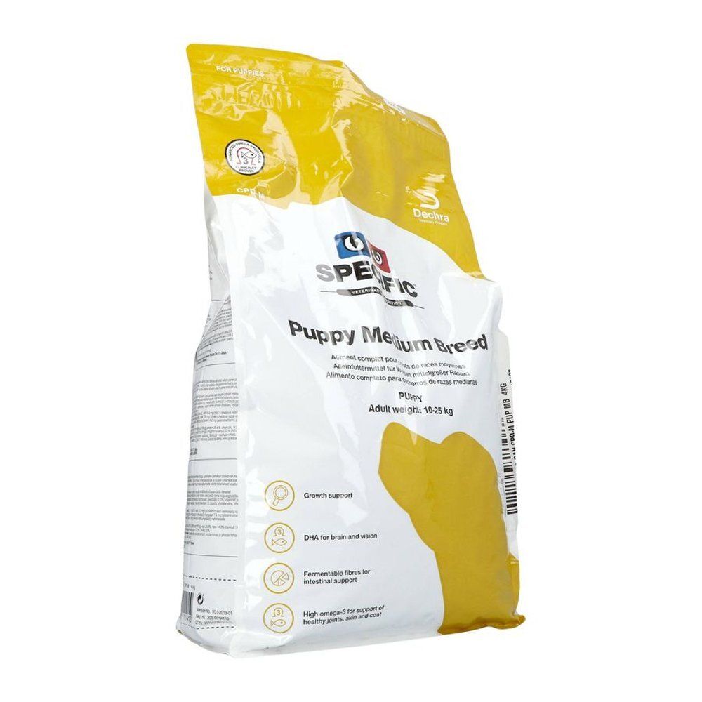 Emballage de nourriture pour chiens. Blanc et jaune. Inscription : SPECIFIC Puppy Medium Breed. Contient des informations sur les ingrédients et la cible.