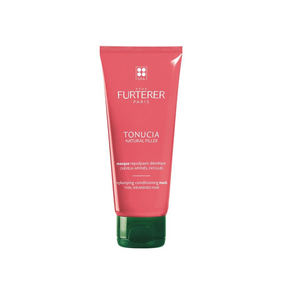 Tube rose avec bouchon vert. Inscription: René Furterer Paris, Tonucia Natural Filler. Texte en français et en anglais.
