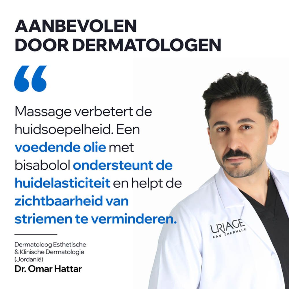 Man met snor in witte jas glimlacht. "Uriage Eau Thermale" op de jas.