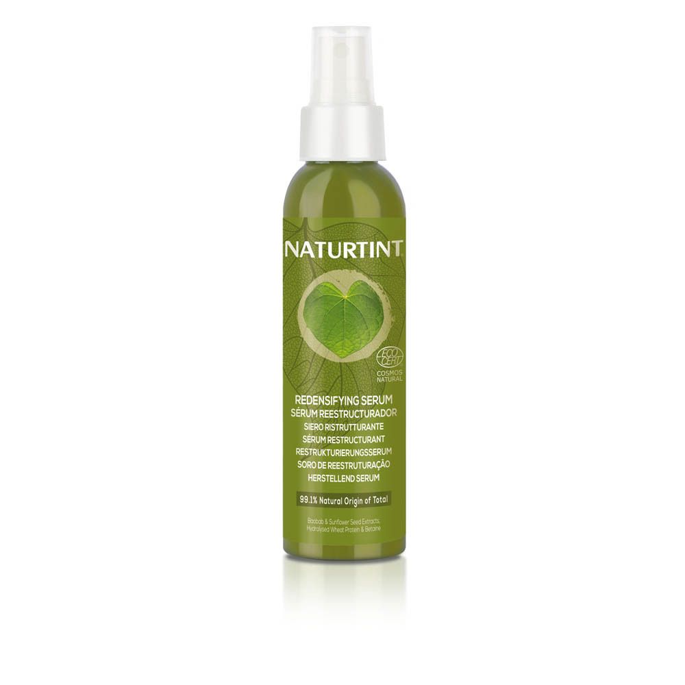 Groene fles met verstuiver. Etiket met NATURTINT, bladlogo en tekst. COSMOS NATURAL-certificering.