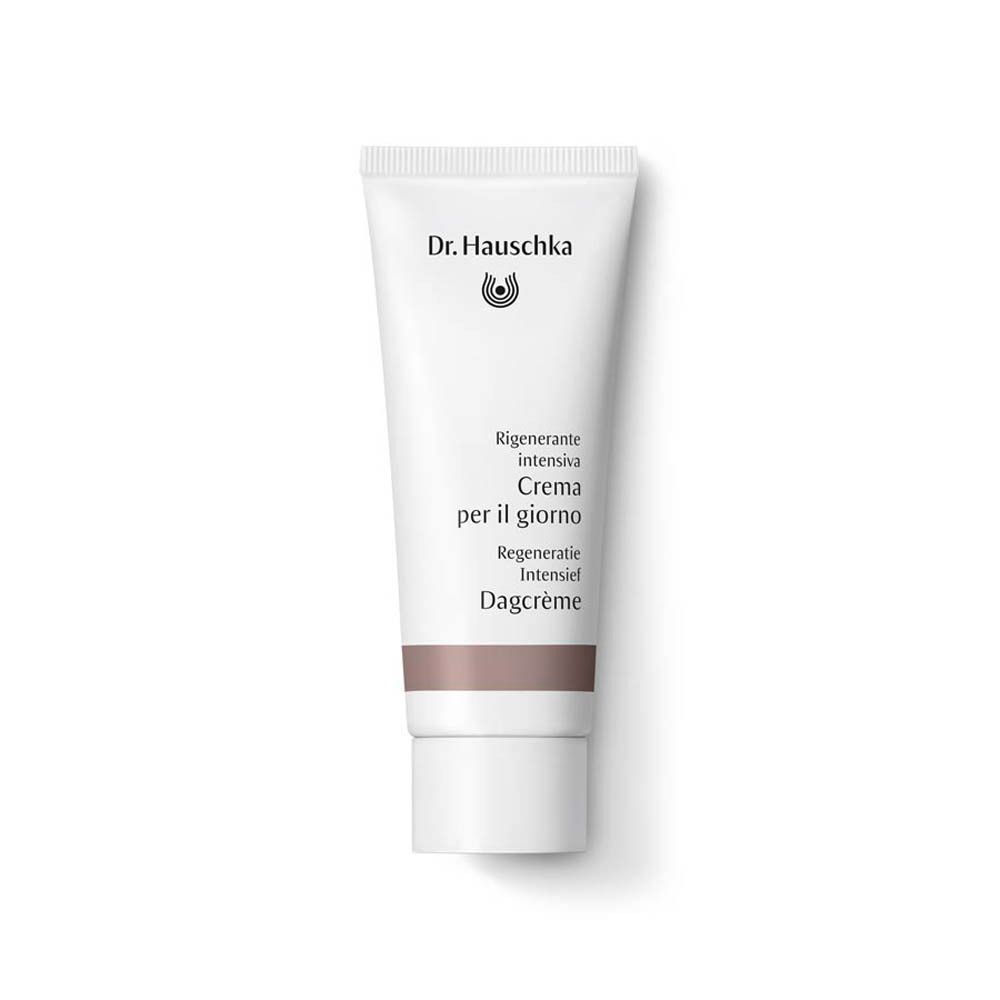 Witte tube met opschrift: Dr. Hauschka, Crème per il giorno, Regeneration Dagcrème Intensief. Bruine streep.