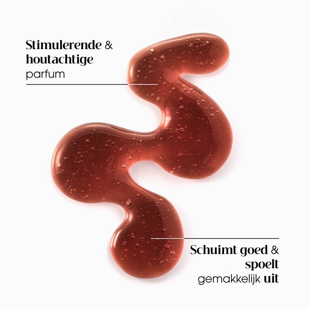 Bruine, golfvormige vloeistof. Tekst: Stimulerende & houtachtige parfum, Schuimt goed & spoelt gemakkelijk uit.