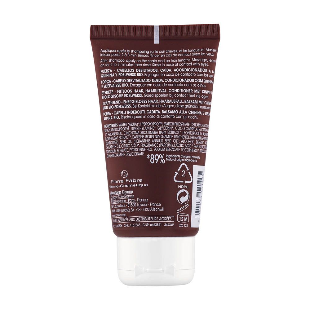 Dos du tube marron de Klorane après-shampooing. Texte et logos. 89% ingrédients d'origine naturelle. Symbole 12M.