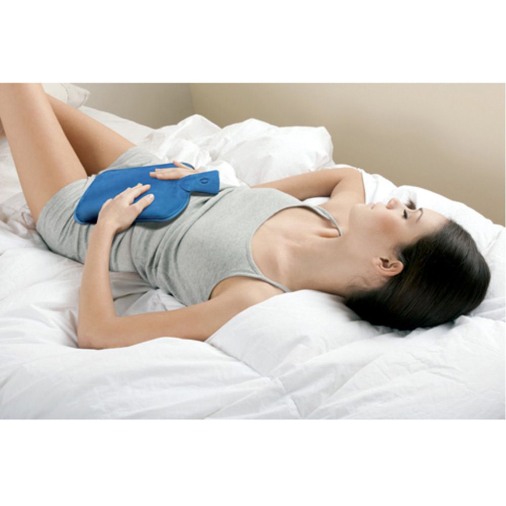 Verpakking 3M Nexcare ColdHot Therapy Pack. Blauwe warmwaterkruik, traditioneel. Productafbeelding en meertalige tekst.