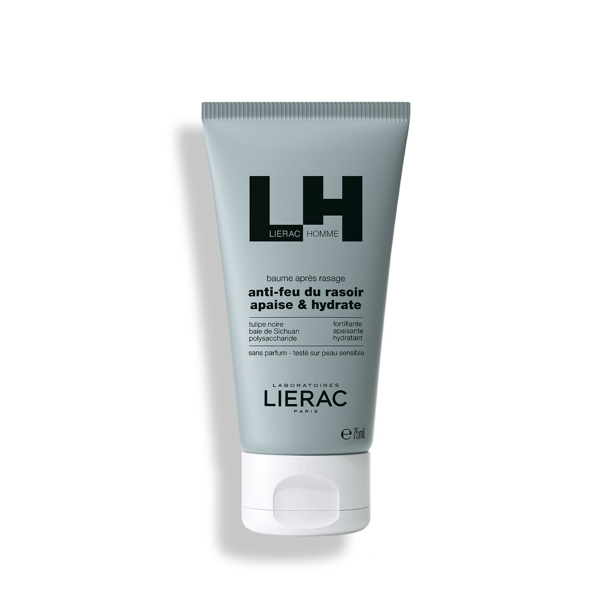 Lichtgrijze tube met witte dop. Opschrift: LH, LIERAC HOMME, baume après rasage, anti-feu du rasoir, apaise & hydrate. 75ml.