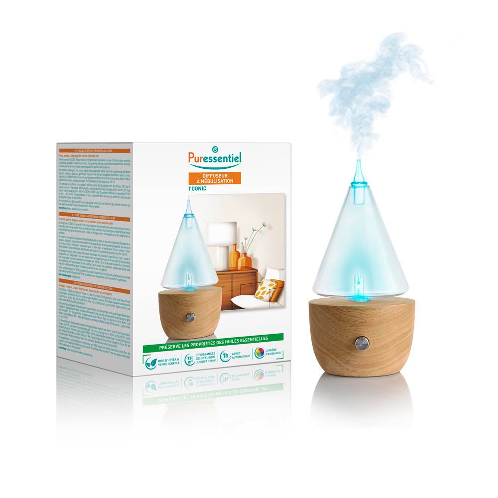 Aromaverspreider met houten basis en glazen opzetstuk. Stoom zichtbaar. Verpakking met productnaam en logo.
