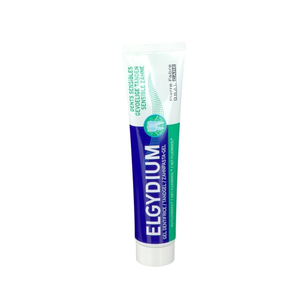 Tube de gel dentifrice. Blanc, bleu et vert. Texte: ELGYDIUM, Dents sensibles, Pierre Fabre.